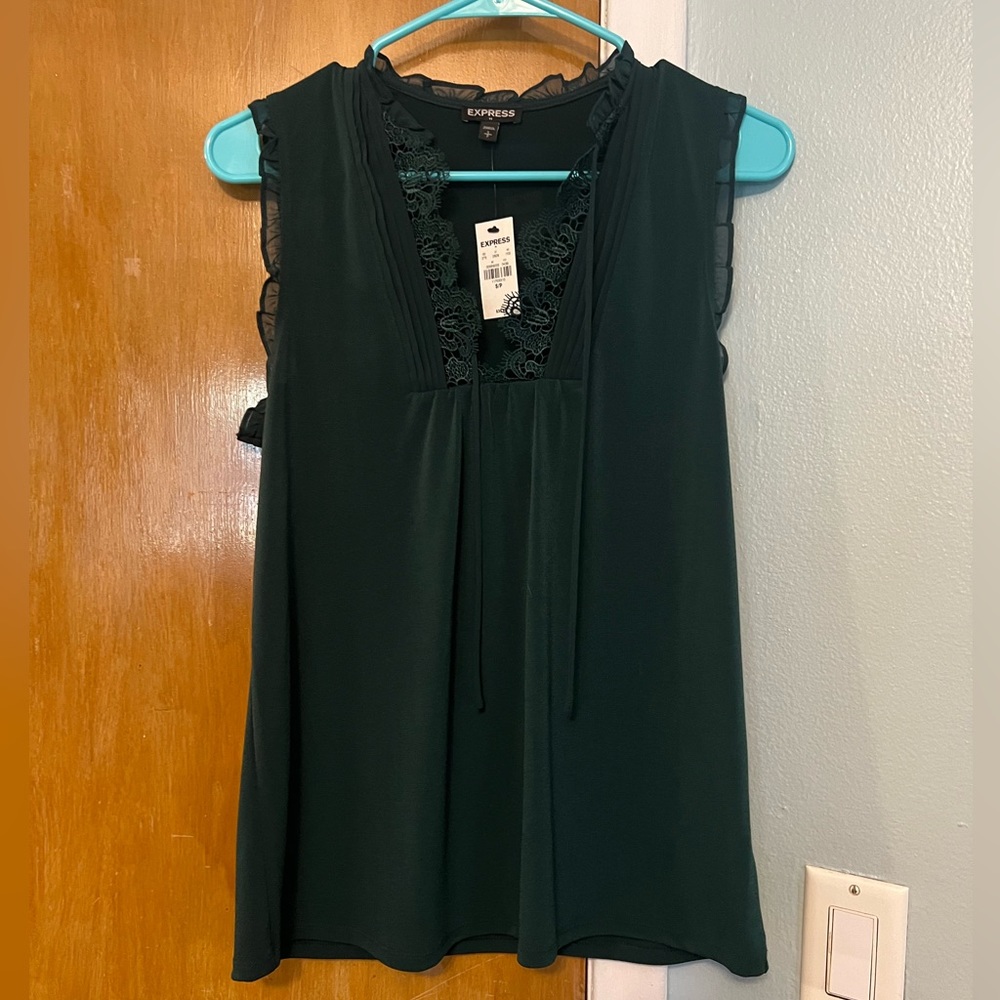 Express brand new with tags!  Deep forest green blouse. Size small